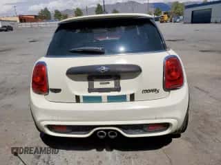 2015 MINI Hardtop S with VIN WMWXP7C56F2A58203, listed as a Copart auction lot 62602855 with 101,679 mi miles and Salvage title. Bid and sale history available at DreamBid. Image 6.