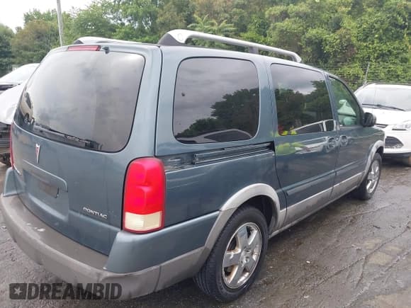 ✅ 2005 Pontiac Montana 1SB • VIN: 1GMDV33L05D230093 • Лот: 42439212. Опубликован ранее на IAAI с пробегом 196 381 миль. Бесплатный доступ к архиву аукционных продаж из США и подробный отчёт об истории автомобиля на DreamBid. Изображение 4.