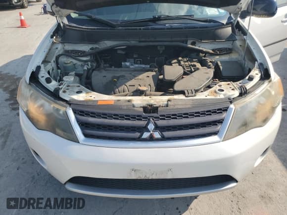 ✅ 2008 Mitsubishi Outlander ES • VIN: JA4LT21W38Z004760 • Lot: 59274325. Listed on Copart with 102,060 mi. Free auction sales archive from the USA and detailed vehicle history report at DreamBid. Image 11.