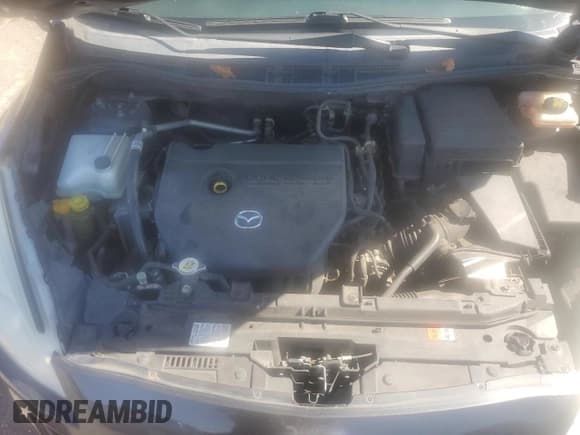 ✅ 2014 Mazda 5 Sport • VIN: JM1CW2BLXE0165897 • Lot: 89671535. Listed on Copart with 101,684 mi. Free auction sales archive from the USA and detailed vehicle history report at DreamBid. Image 11.