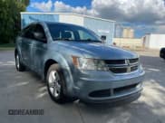 ✅ 2013 Dodge Journey Canada Value • VIN: 3C4PDCAB2DT558560 • Lot: 62786185. Listed on Copart with 206,532 mi. Free auction sales archive from the USA and detailed vehicle history report at DreamBid. Image 1.