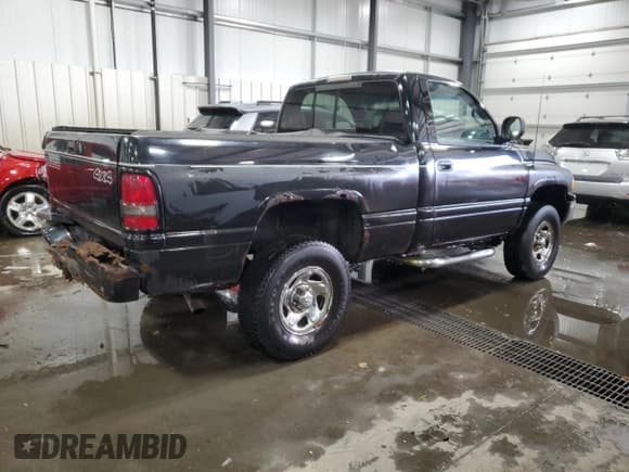 ✅ 1999 Dodge 1500 • VIN: 1B7HF16Y5XS150818 • Lot: 83490054. Listed on Copart with 118,584 mi. Free auction sales archive from the USA and detailed vehicle history report at DreamBid. Image 3.