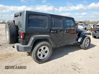 ✅ 2015 Jeep Wrangler Unlimited Sahara • VIN: 1C4HJWEGXFL624906 • Лот: 91418085. Опубликован ранее на Copart с пробегом 206 272 миль. Бесплатный доступ к архиву аукционных продаж из США и подробный отчёт об истории автомобиля на DreamBid. Изображение 3.
