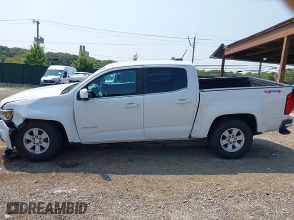 ✅ 2020 Chevrolet Colorado 4WD Work Truck • VIN: 1GCGTBEN3L1132545 • Lot: 42856502. Listed on IAAI with 86,569 mi. Free auction sales archive from the USA and detailed vehicle history report at DreamBid. Image 14.
