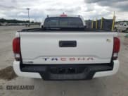 ✅ 2022 Toyota Tacoma SR • VIN: 3TYRX5GN1NT040078 • Lot: 69957595. Listed on Copart with 24,018 mi. Free auction sales archive from the USA and detailed vehicle history report at DreamBid. Image 6.