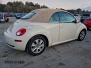 ✅ 2009 Volkswagen Beetle S • VIN: 3VWRG31Y99M400641 • Lot: 96970915. Listed on Copart with 200,413 mi. Free auction sales archive from the USA and detailed vehicle history report at DreamBid. Image 3.