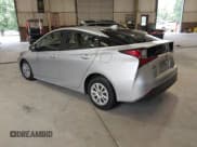 ✅ 2021 Toyota Prius L Eco • VIN: JTDKAMFUXM3144568 • Lot: 42689815. Listed on IAAI with 78,721 mi. Free auction sales archive from the USA and detailed vehicle history report at DreamBid. Image 3.