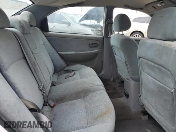 ✅ 2003 Kia Optima LX • VIN: KNAGD126335210008 • Lot: 67408705. Listed on Copart with 212,574 mi. Free auction sales archive from the USA and detailed vehicle history report at DreamBid. Image 10.