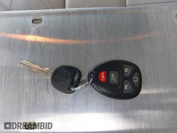 2015 Chevrolet Traverse LT z VIN 1GNKVHKDXFJ112775, wystawiony jako IAAI lot #43396691 z przebiegiem Nie podano mil oraz . Historia ofert i sprzedaży dostępna na DreamBid. Obrazek 11.