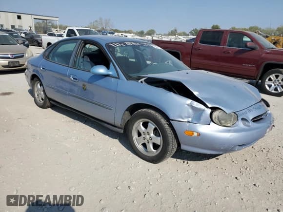 ✅ 1998 Ford Taurus LX • VIN: 1FAFP52U4WG270311 • Lot: 75351194. Listed on Copart with 130,071 mi. Free auction sales archive from the USA and detailed vehicle history report at DreamBid. Image 4.