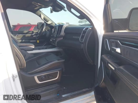 ✅ 2021 Ram 1500 Laramie • VIN: 1C6SRFJT4MN576054 • Lot: 43258491. Listed on IAAI with 103,062 mi. Free auction sales archive from the USA and detailed vehicle history report at DreamBid. Image 5.