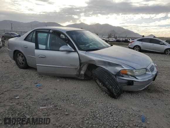 ✅ 2001 Buick Regal LS • VIN: 2G4WB55K211157297 • Lot: 92422445. Listed on Copart with 127,553 mi. Free auction sales archive from the USA and detailed vehicle history report at DreamBid. Image 4.