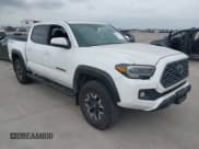 ✅ 2022 Toyota Tacoma SR • VIN: 3TMCZ5AN7NM493268 • Lot: 42041593. Listed on IAAI with 100,589 mi. Free auction sales archive from the USA and detailed vehicle history report at DreamBid. Image 1.
