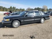 ✅ 1997 Lincoln Town Car Signature • VIN: 1LNLM82W2VY619947 • Lot: 91347265. Listed on Copart with 106,087 mi. Free auction sales archive from the USA and detailed vehicle history report at DreamBid. Image 1.
