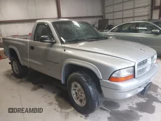✅ 2001 Dodge Dakota • VIN: 1B7GG26X21S118759 • Lot: 41943297. Wystawiony na IAAI z przebiegiem 156 372 mil. Bezpłatny archiwum sprzedaży aukcyjnych z USA i szczegółowy raport historii pojazdu na DreamBid. Zdjęcie 1.