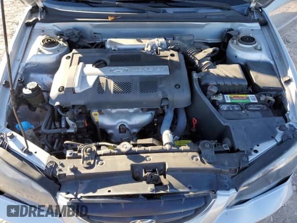 2005 Hyundai Elantra GLS z VIN KMHDN46DX5U041428, wystawiony jako Copart lot #80684274 z przebiegiem 109 025 mil mil oraz Szkoda całkowita • Salvage title. Historia ofert i sprzedaży dostępna na DreamBid. Obrazek 11.