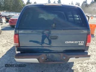 ✅ 2003 Dodge Dakota SLT • VIN: 1D7HL48N03S299182 • Lot: 53520675. Wystawiony na Copart z przebiegiem Nie podano. Bezpłatny archiwum sprzedaży aukcyjnych z USA i szczegółowy raport historii pojazdu na DreamBid. Zdjęcie 6.