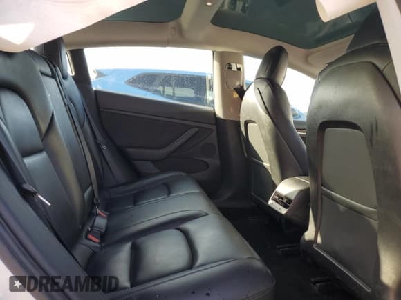 ✅ 2021 Tesla Model 3 Standard Range Plus • VIN: 5YJ3E1EA8MF053803 • Лот: 66449765. Опубликован ранее на Copart с пробегом 69 949 миль. Бесплатный доступ к архиву аукционных продаж из США и подробный отчёт об истории автомобиля на DreamBid. Изображение 10.