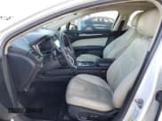 ✅ 2017 Ford Fusion Hybrid Titanium • VIN: 3FA6P0RUXHR234093 • Lot: 57997865. Wystawiony na Copart z przebiegiem 124 862 mil. Bezpłatny archiwum sprzedaży aukcyjnych z USA i szczegółowy raport historii pojazdu na DreamBid. Zdjęcie 7.