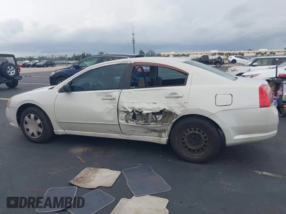 ✅ 2004 Mitsubishi Galant ES • VIN: 4A3AB36FX4E071031 • Lot: 42376783. Listed on IAAI with 145,475 mi. Free auction sales archive from the USA and detailed vehicle history report at DreamBid. Image 14.