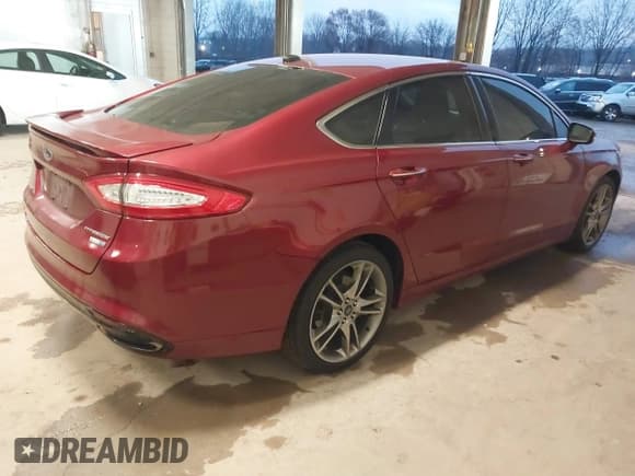 ✅ 2015 Ford Fusion Titanium • VIN: 3FA6P0D90FR287451 • Лот: 43780577. Опубликован ранее на IAAI с пробегом 162 309 миль. Бесплатный доступ к архиву аукционных продаж из США и подробный отчёт об истории автомобиля на DreamBid. Изображение 4.
