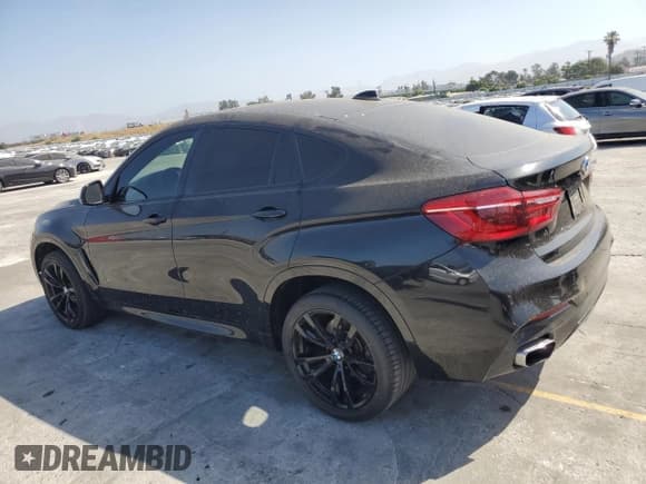 ✅ 2019 BMW X6 xDrive50i • VIN: 5UXKU6C52KLP60647 • Lot: 59463424. Listed on Copart with 41,351 mi. Free auction sales archive from the USA and detailed vehicle history report at DreamBid. Image 2.