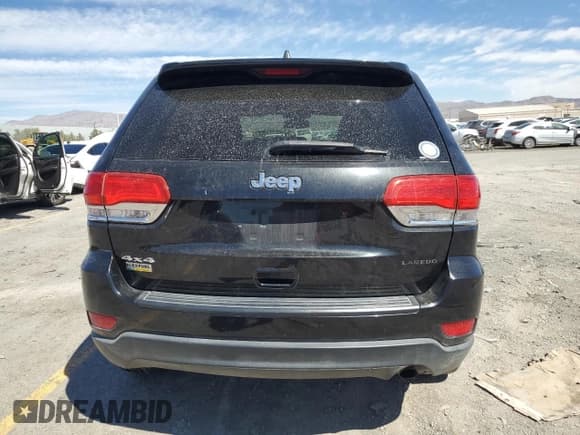 ✅ 2015 Jeep Grand Cherokee Laredo • VIN: 1C4RJFAG2FC111594 • Лот: 71884335. Опубликован ранее на Copart с пробегом 127 087 миль. Бесплатный доступ к архиву аукционных продаж из США и подробный отчёт об истории автомобиля на DreamBid. Изображение 6.