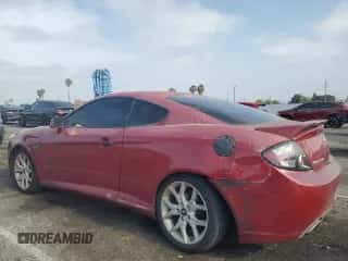 2007 Hyundai Tiburon GT z VIN KMHHN66F27U238272, wystawiony jako Copart lot #59218205 z przebiegiem 218 279 mil mil oraz Szkoda całkowita • Salvage title. Historia ofert i sprzedaży dostępna na DreamBid. Obrazek 2.
