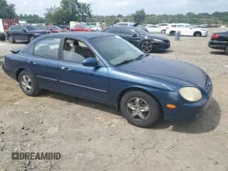 ✅ 1999 Hyundai Sonata • VIN: KMHWF25S2XA050994 • Lot: 65175665. Listed on Copart with 91,802 mi. Free auction sales archive from the USA and detailed vehicle history report at DreamBid. Image 4.