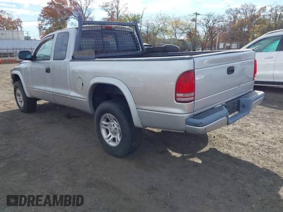 2003 Dodge Dakota Sport with VIN 1D7HG32N43S138938, listed as a IAAI auction lot 43610418 with 112,101 mi miles and . Bid and sale history available at DreamBid. Image 3.