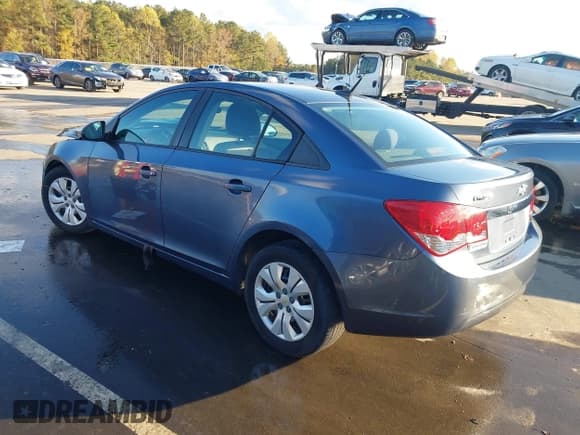 ✅ 2014 Chevrolet Cruze LS • VIN: 1G1PA5SHXE7464206 • Lot: 43599999. Listed on IAAI with 130,122 mi. Free auction sales archive from the USA and detailed vehicle history report at DreamBid. Image 3.