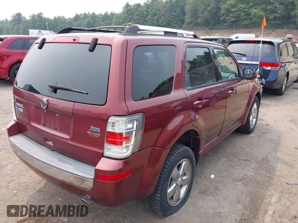 2010 Mercury Mariner Premier with VIN 4M2CN9HG2AKJ12271, listed as a IAAI auction lot 42896746 with 229,869 mi miles and . Bid and sale history available at DreamBid. Image 4.