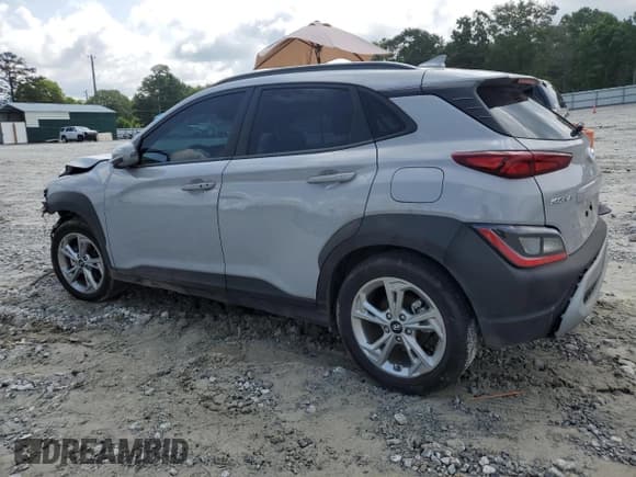 ✅ 2023 Hyundai Kona SEL • VIN: KM8K62AB3PU039635 • Лот: 65138184. Опубликован ранее на Copart с пробегом 21 982 миль. Бесплатный доступ к архиву аукционных продаж из США и подробный отчёт об истории автомобиля на DreamBid. Изображение 2.
