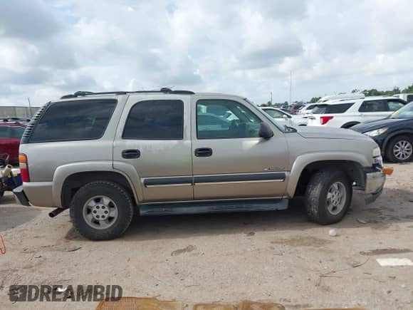 2002 Chevrolet Tahoe LS with VIN 1GNEC13Z42R246617, listed as a IAAI auction lot 42675524 with 306,596 mi miles and . Bid and sale history available at DreamBid. Image 12.