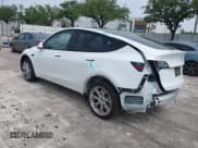 ✅ 2023 Tesla Model Y Long Range • VIN: 7SAYGDEE0PA065534 • Lot: 42445868. Listed on IAAI with 22,638 mi. Free auction sales archive from the USA and detailed vehicle history report at DreamBid. Image 3.