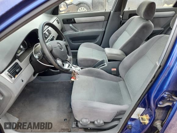 ✅ 2006 Suzuki Forenza • VIN: KL5JD56Z06K334060 • Lot: 85164135. Listed on Copart with 135,880 mi. Free auction sales archive from the USA and detailed vehicle history report at DreamBid. Image 7.