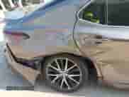 2021 Toyota Camry SE with VIN 4T1G11BK6MU029724, listed as a IAAI auction lot 42686894 with 92,496 mi miles and . Bid and sale history available at DreamBid. Image 6.