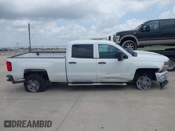 ✅ 2017 Chevrolet Silverado 2500HD Work Truck • VIN: 1GC1KUEG1HF101312 • Lot: 42435610. Listed on IAAI with 120,959 mi. Free auction sales archive from the USA and detailed vehicle history report at DreamBid. Image 13.