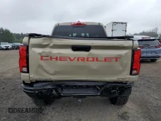 ✅ 2023 Chevrolet Colorado 4WD ZR2 • VIN: 1GCPTFEK6P1212067 • Лот: 68128724. Опубликован ранее на Copart с пробегом 12 859 миль. Бесплатный доступ к архиву аукционных продаж из США и подробный отчёт об истории автомобиля на DreamBid. Изображение 6.