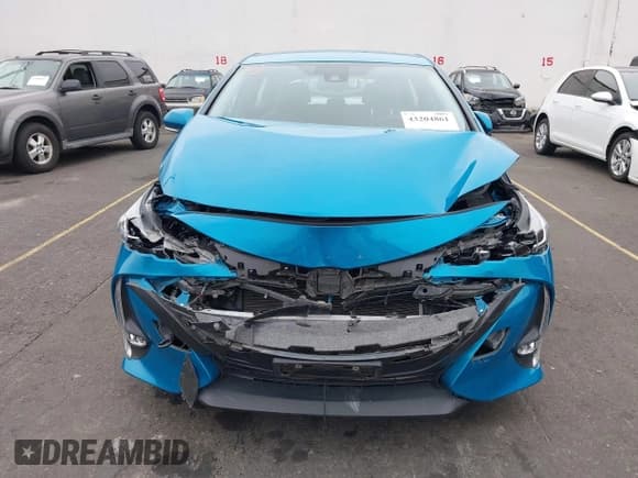 ✅ 2021 Toyota Prius Limited • VIN: JTDKAMFP6M3171423 • Lot: 43204861. Listed on IAAI with 30,628 mi. Free auction sales archive from the USA and detailed vehicle history report at DreamBid. Image 12.
