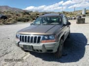 ✅ 2002 Jeep Grand Cherokee Laredo • VIN: 1J4GW48S52C232227 • Lot: 85100645. Listed on Copart with 128,563 mi. Free auction sales archive from the USA and detailed vehicle history report at DreamBid. Image 14.