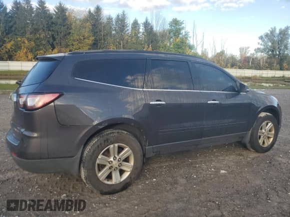 2014 Chevrolet Traverse LT z VIN 1GNKRGKD2EJ106126, wystawiony jako Copart lot #82273195 z przebiegiem 234 917 mil mil oraz Szkoda całkowita • Salvage title. Historia ofert i sprzedaży dostępna na DreamBid. Obrazek 3.