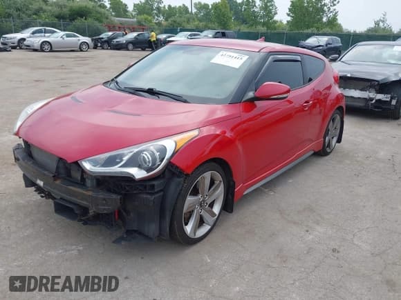 ✅ 2013 Hyundai Veloster Turbo • VIN: KMHTC6AE6DU118825 • Lot: 42751415. Wystawiony na IAAI z przebiegiem 74 097 mil. Bezpłatny archiwum sprzedaży aukcyjnych z USA i szczegółowy raport historii pojazdu na DreamBid. Zdjęcie 2.