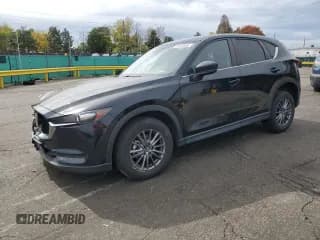 ✅ 2021 Mazda CX-5 Touring • VIN: JM3KFBCM1M0441604 • Lot: 86183445. Wystawiony na Copart z przebiegiem 32 923 mil. Bezpłatny archiwum sprzedaży aukcyjnych z USA i szczegółowy raport historii pojazdu na DreamBid. Zdjęcie 1.