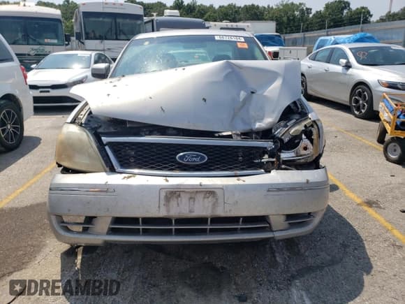 ✅ 2005 Ford Five Hundred SE • VIN: 1FAFP23145G121849 • Lot: 66726184. Wystawiony na Copart z przebiegiem 222 968 mil. Bezpłatny archiwum sprzedaży aukcyjnych z USA i szczegółowy raport historii pojazdu na DreamBid. Zdjęcie 5.