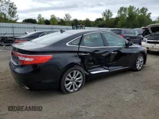 ✅ 2014 Hyundai Azera • VIN: KMHFG4JG1EA353501 • Лот: 69434545. Опубликован ранее на Copart с пробегом 64 693 миль. Бесплатный доступ к архиву аукционных продаж из США и подробный отчёт об истории автомобиля на DreamBid. Изображение 3.