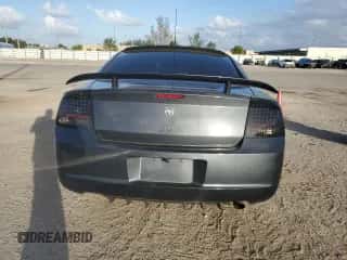 2008 Dodge Charger SXT с VIN 2B3KA33G18H144715, выставлен на аукционе Copart как лот 77578504 с пробегом 158 834 миль миль и Списание • Salvage title. История ставок и продаж доступна на DreamBid. Изображение 6.