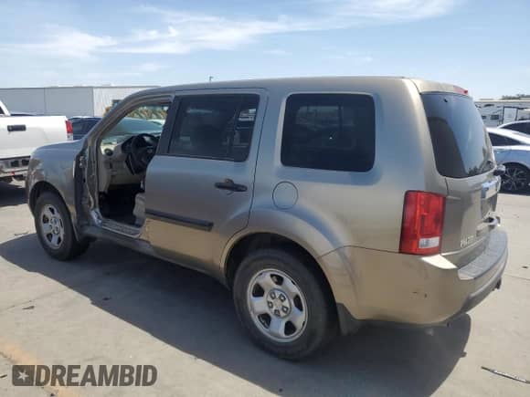 2010 Honda Pilot LX with VIN 5FNYF4H2XAB014666, listed as a Copart auction lot 58804695 with 216,948 mi miles and Salvage title. Bid and sale history available at DreamBid. Image 2.