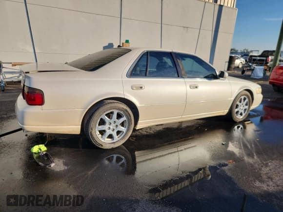 ✅ 2003 Cadillac Seville Touring STS • VIN: 1G6KY54973U208920 • Lot: 92802255. Wystawiony na Copart z przebiegiem 274 567 mil. Bezpłatny archiwum sprzedaży aukcyjnych z USA i szczegółowy raport historii pojazdu na DreamBid. Zdjęcie 3.