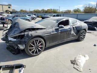 ✅ 2011 Aston Martin Rapide • VIN: SCFHDDAJXBAF01954 • Lot: 82289724. Wystawiony na Copart z przebiegiem 40 184 mil. Bezpłatny archiwum sprzedaży aukcyjnych z USA i szczegółowy raport historii pojazdu na DreamBid. Zdjęcie 1.